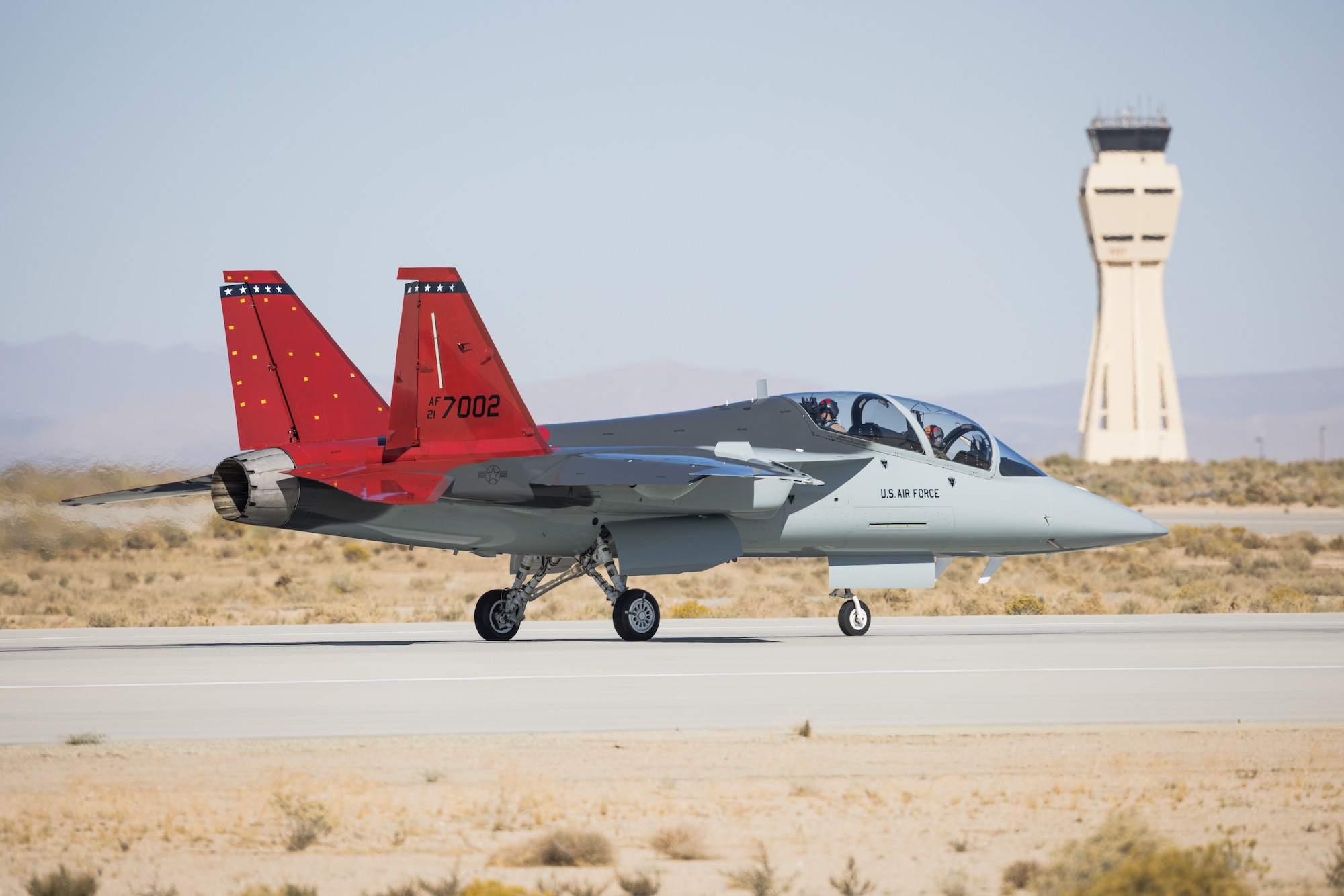 The first T-7A Red Hawk arrives at Edwards Air Force Base, California, Nov. 8. The aircraft’s test campaign is being executed by the T-7A Integrated Test Force, part of the Airpower Foundations Combined Test Force in association with the 416th Flight Test Squadron. The Integrated Test Force is a partnership between the USAF and T-7A manufacturer, The Boeing Company. (Air Force photo by Joshua McClanahan)