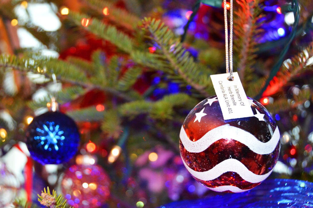 Volunteers from the Wisconsin National Guard helped decorate the Tribute to our Troops Tree at the Wisconsin Executive Residence in Maple Bluff, Wisconsin Nov. 29.