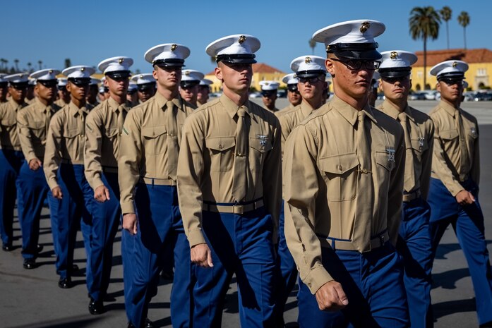 U.S. Marines with Mike Company, 3rd Recruit Training Battalion, march in formation during a graduation ceremony at Marine Corps Recruit Depot San Diego, Nov. 8, 2023. Graduation took place at the completion of the 13-week transformation, which included training for drill, marksmanship, basic combat skills, and Marine Corps customs and traditions. (U.S. Marine Corps photo by Lance Cpl. Jacob B. Hutchinson)