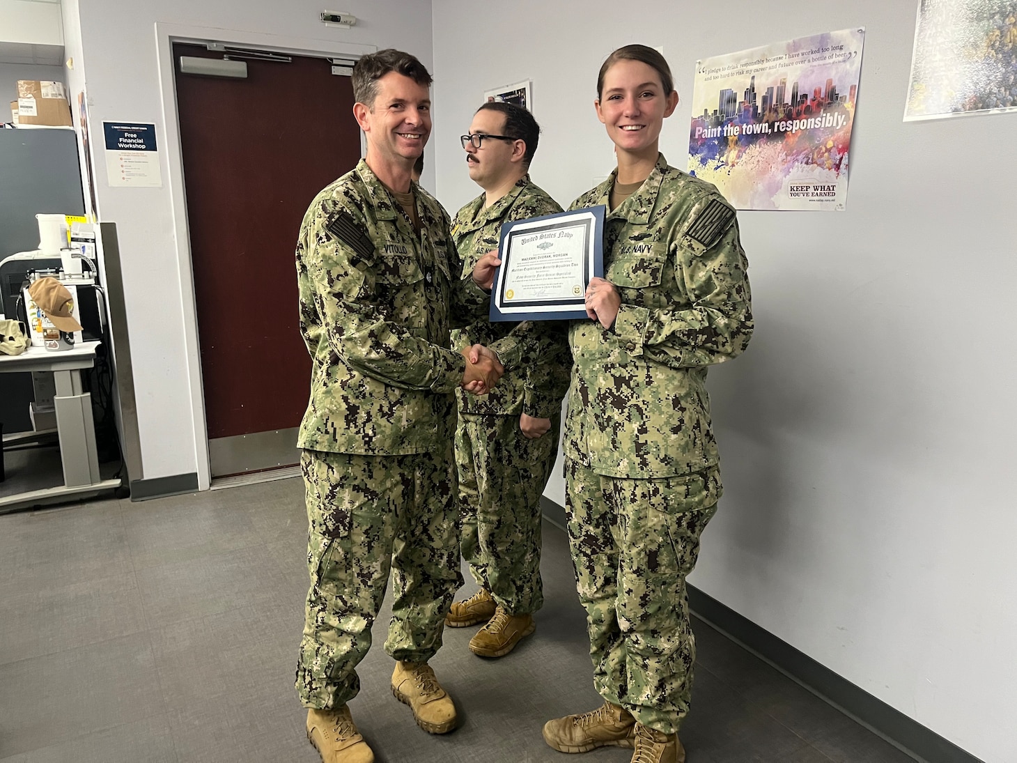 231108-N-N0748-1003 VIRGINIA BEACH, VA (Nov. 8, 2023) Master at Arms 2nd Class Morgan Dvorak from Maritime Expeditionary Security Squadron (MSRON) 2 receives her Navy Security Force (NSF) specialist breast insignia Nov. 8, 2023. The NSF qualification program builds on technical and tactical professional knowledge required to succeed in the MA rating. (U.S. Navy courtesy photo)