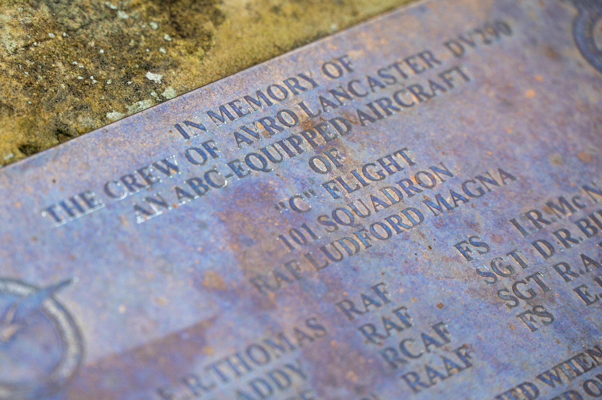 A close up of a memorial plaque.