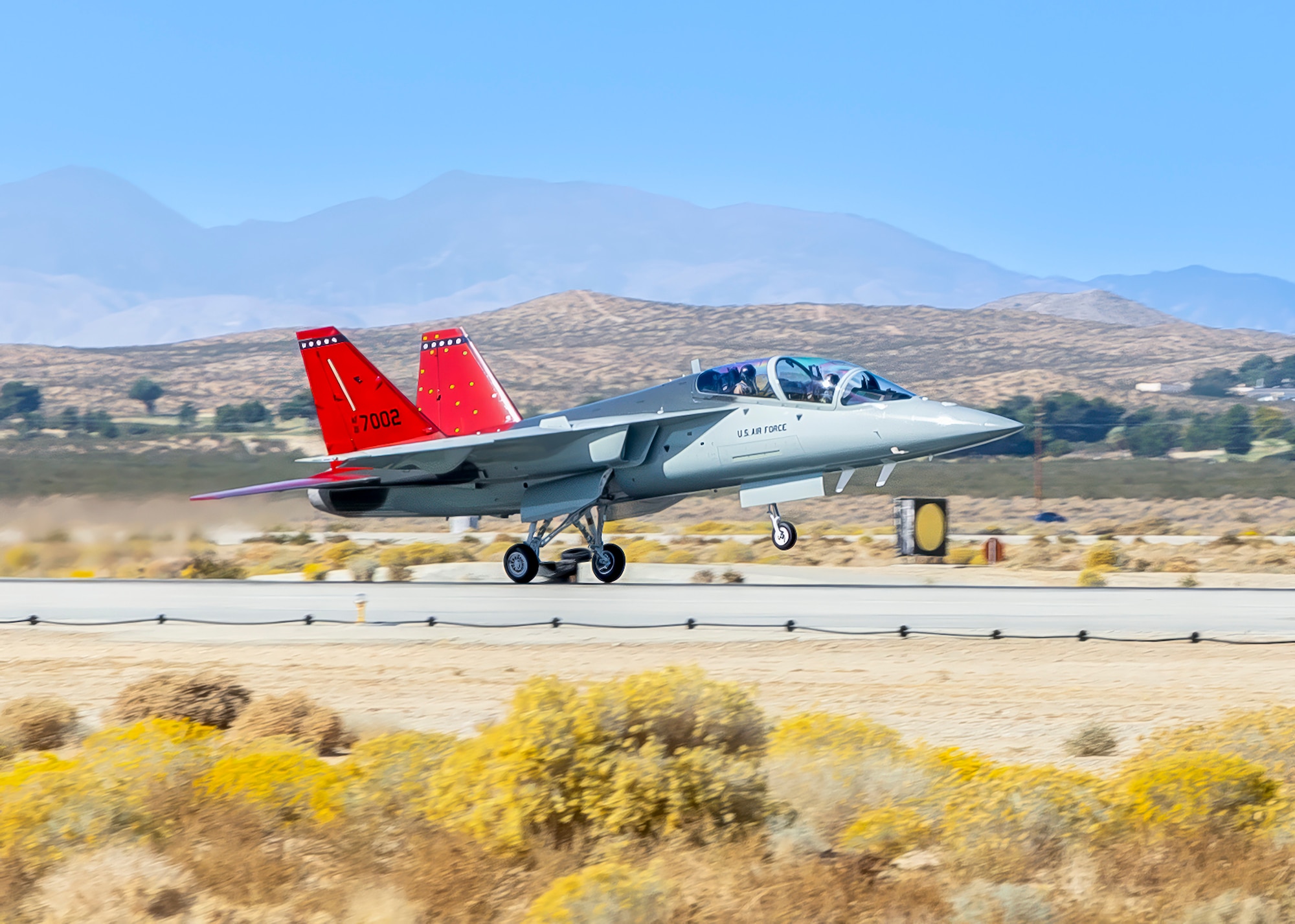 The first T-7A Red Hawk arrives at Edwards Air Force Base, California, Nov. 8. The aircraft’s test campaign is being executed by the T-7A Integrated Test Force, part of the Airpower Foundations Combined Test Force in association with the 416th Flight Test Squadron. The Integrated Test Force is a partnership between the USAF and T-7A manufacturer, The Boeing Company. (Air Force photo by Todd Schannuth)