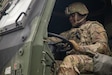 U.S. Army Reserve Spc. Johnathan Woody, a motor transport operator assigned to South Carolina’s 414th Transportation Company, performs a preventive maintenance check and services during a culminating training event in Karliki, Poland, on Nov. 5, 2023. The 414th Transportation Company focused on individual, crew, platoon, and company warfighting mastery, ensuring victory at the point of contract.