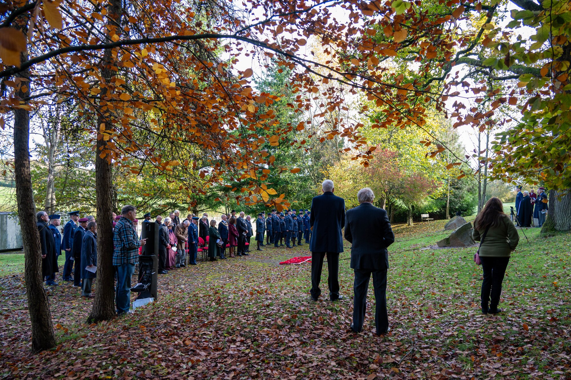 A crowd gathers at RAF Welford’s Memorial Grove during a Remembrance Day ceremony.