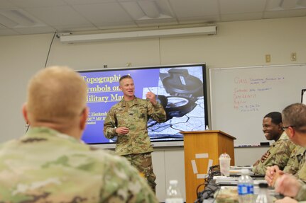 Sgt. 1st Class Gregory Heckenbach gives a block of instruction on topographical symbols on a map, during the Instructor of the Year Competition. Soldiers from all three division under the 80th Training Command competed in the 80th Training Command’s Fiscal Year 24 Instructor of the Year Competition (IOY) on October 25 – 28, 2023.