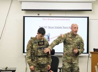 Lt. Col. Brian Wice, shares the importance of properly packing your gear during his block of instruction at the 80th Training Command's Instructor of the Year Competition. Soldiers from all three division under the 80th Training Command competed in the 80th Training Command’s Fiscal Year 24 Instructor of the Year Competition (IOY) on October 25 – 28, 2023.