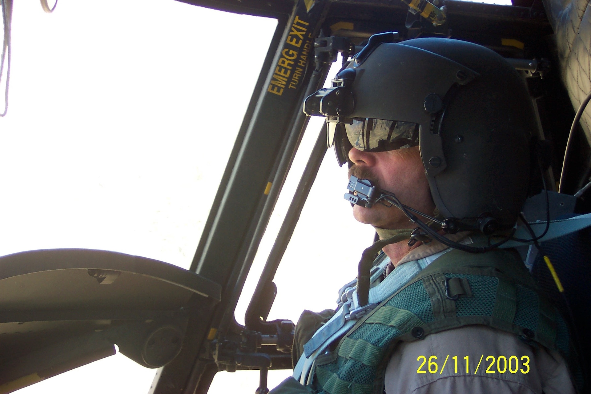Chief Warrant Officer 3 Paul Barnes of the Pennsylvania National Guard’s Company G, 104th Aviation Regiment lands flies a CH-47 Chinook helicopter during a deployment to Afghanistan in 2003. (Photo courtesy of Paul Barnes)