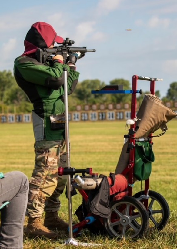 Staff Sgt. Aaron Cobosco, of the Wisconsin Army National Guard’s 1st Battalion, 128th Infantry Regiment, fires a round during one of the lanes at the President’s Pistol and President’s Rifle Matches in July at Camp Perry, Ohio. Cobsco scored in the top 10o of competitors, earning the prestigious President’s Hundred tab. Submitted photo