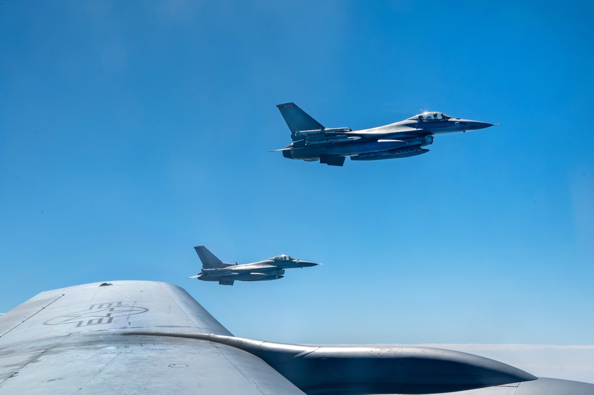 A KC-135 Stratotanker prepares to refuel a B-1 Lancer.