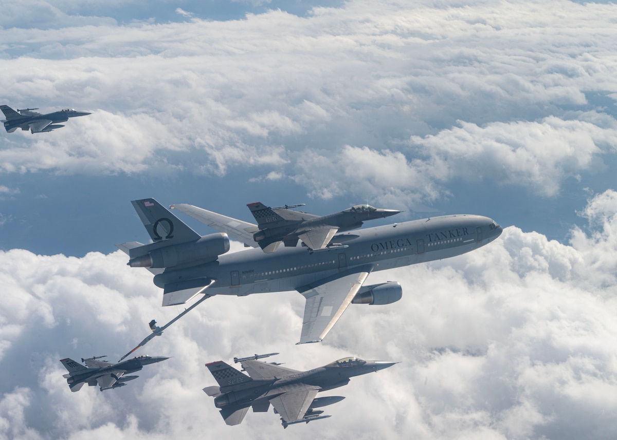 Photo of a commercial KDC-10 Tanker refueling a U.S. Air Force F-16 Fighting Falcon
