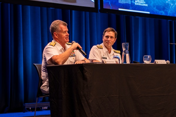 Adm. Samuel Paparo, commander, U.S. Pacific Fleet, left, responds to a question during a panel discussion of senior naval leaders from Australia, Canada, France, India, UK and the U.S. at the  Indo Pacific International Maritime Exposition 2023 in Sydney, Nov. 8. IP23 emphasizes the commitment of the United States, Australia, and partner nations to a free and open Indo-Pacific region. (U.S. Navy photo by Mass Communications Specialist 2nd Class Jeremy R. Boan)