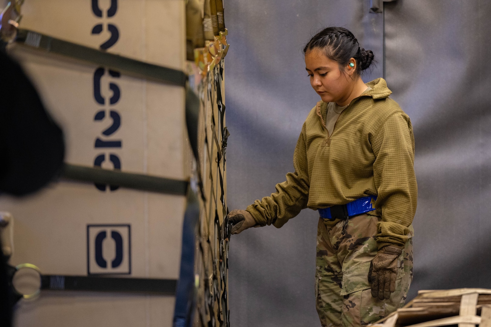 Photo of U.S. Air Force Airman loading cargo