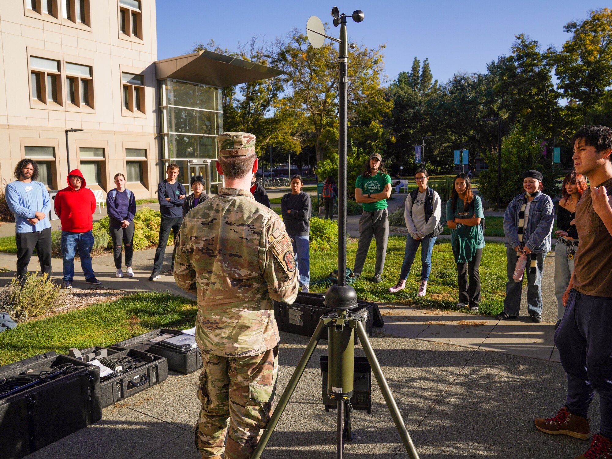 U.S. Air Force Tech. Sgt Zachary Cash, 9th Operations Support Squadron weather forecaster demonstrates how a tactical meteorological observing system (TMOS) is assembled and discusses some of its capabilities at the University of California, Davis, Nov. 07, 2023.