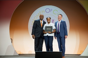 U.S. Air Force Master Sgt. Jazmin Love,  7th Equipment Maintenance Squadron fabrication flight superintendent, is presented with the 2023 Women of Color STEM Technology Rising Star Award at a presentation ceremony in Detroit, Michigan, on October 13, 2023. Love held various roles and responsibilities during this year including serving as an aircraft impoundment official, overseeing tasks such as coordinating a complex engine nacelle removal, strategizing component salvaging, and managing aircraft retirement. (U.S. Air Force Airman 1st Class Alondra Cristobal Hernandez)