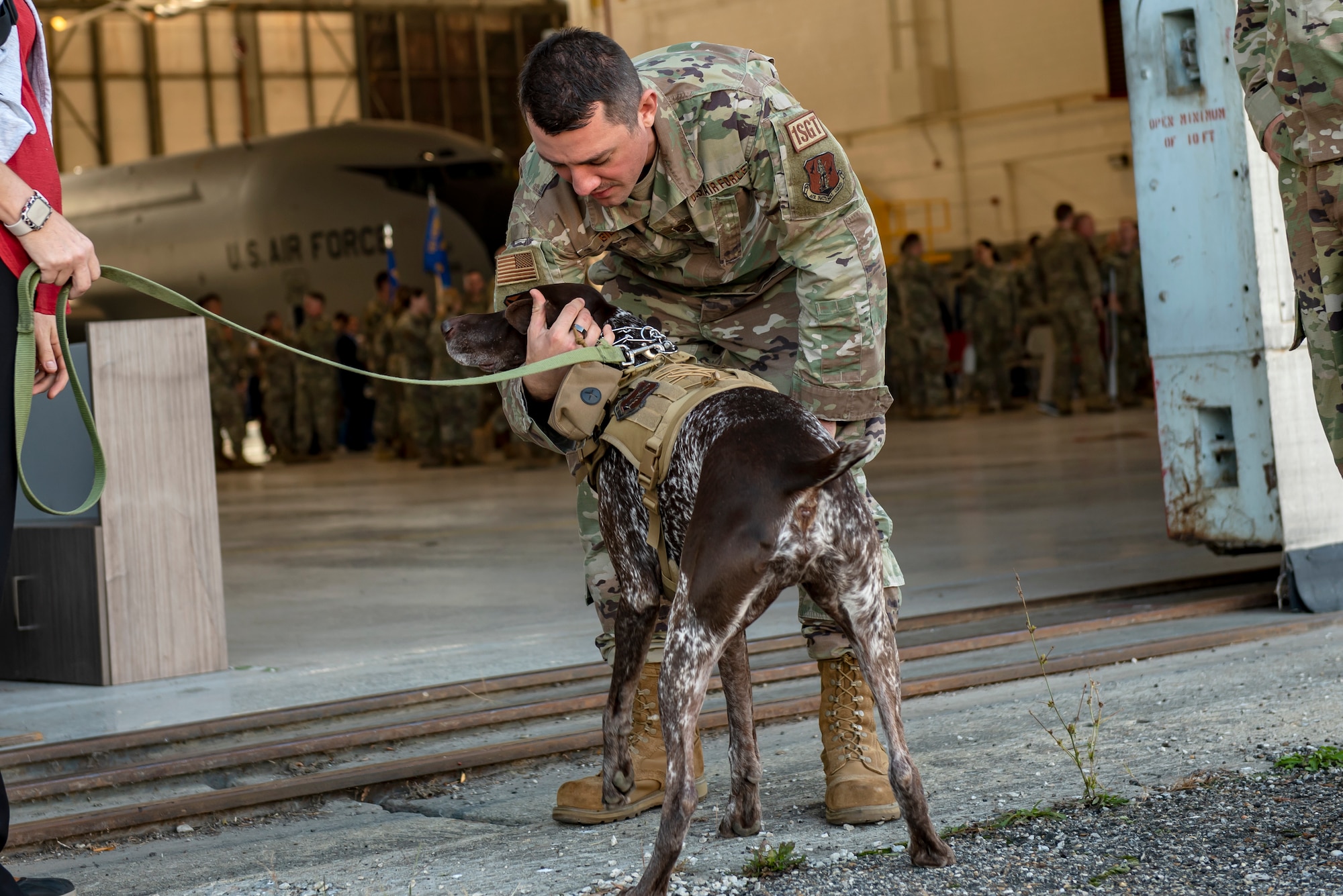 Murphy, a therapy dog with 121st Air Refueling Wing Director of Psychological Health office, greets Airmen and their families after a Change of Command ceremony at Rickenbacker Air National Guard Base, Ohio, Nov. 5, 2023. Murphy’s role with the DPH is to bring joy to Airmen and their families and to help encourage conversations with the resiliency team.