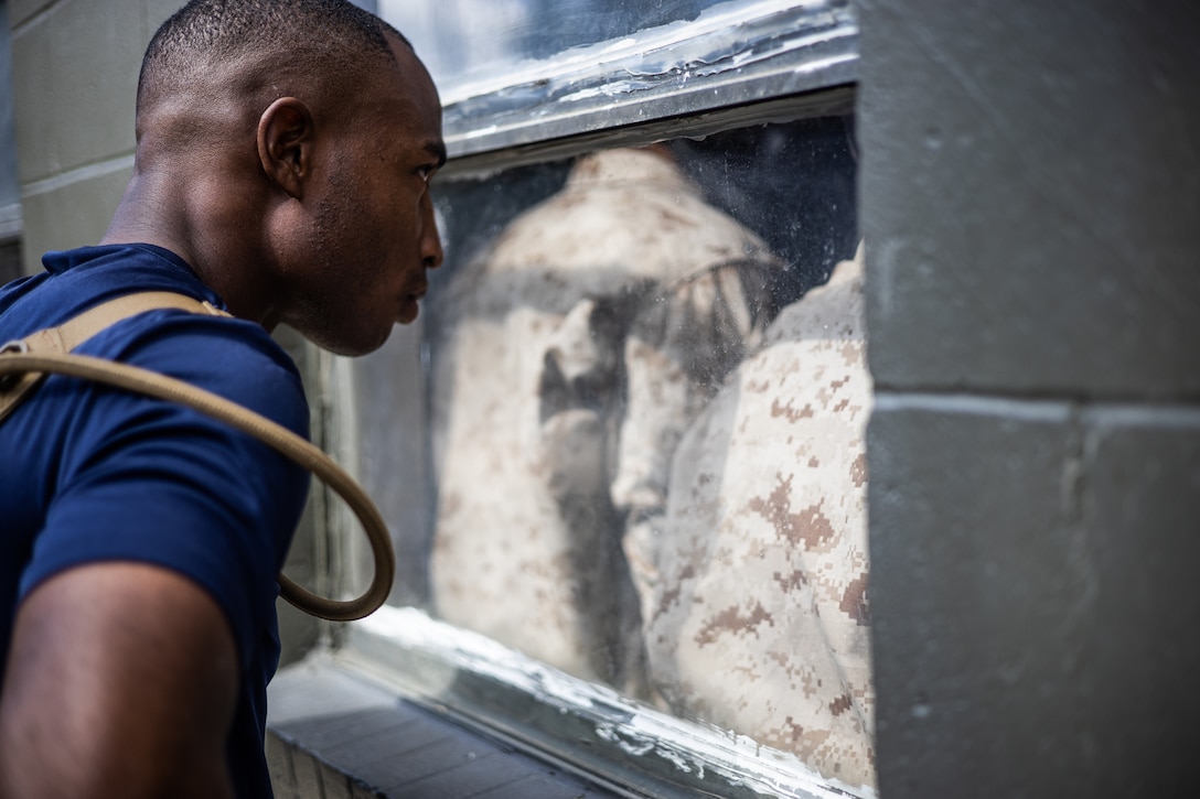 Recruits with November Company, 3rd Recruit Training Battalion, conduct the Gas Chamber during chemical, biological, radiological, and nuclear (CBRN) defense training on Marine Corps Recruit Depot Parris Island, S.C., Oct. 16, 2023. Training for CBRN defense is an event in which recruits are exposed to gas agents in a controlled environment, to familiarize themselves with the use of a gasmask.(U.S. Marine Corps photo by Cpl. Colin Harper)