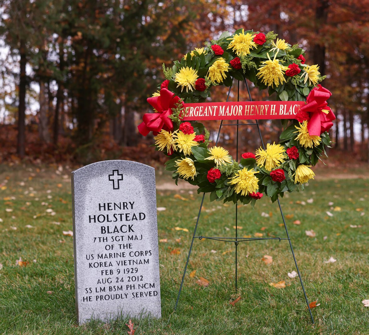 A wreath is placed by the headstone of Sgt. Maj. Henry Black, 7th Sergeant Major of the Marine Corps, during a wreath laying ceremony at the Quantico National Cemetery, Triangle, Virginia, Nov. 10, 2023. The ceremony is held annually on the Marine Corps birthday to honor the memory and military service of Sgt. Maj. Black. (U.S. Marine Corps photo by Lance Cpl. David Brandes)