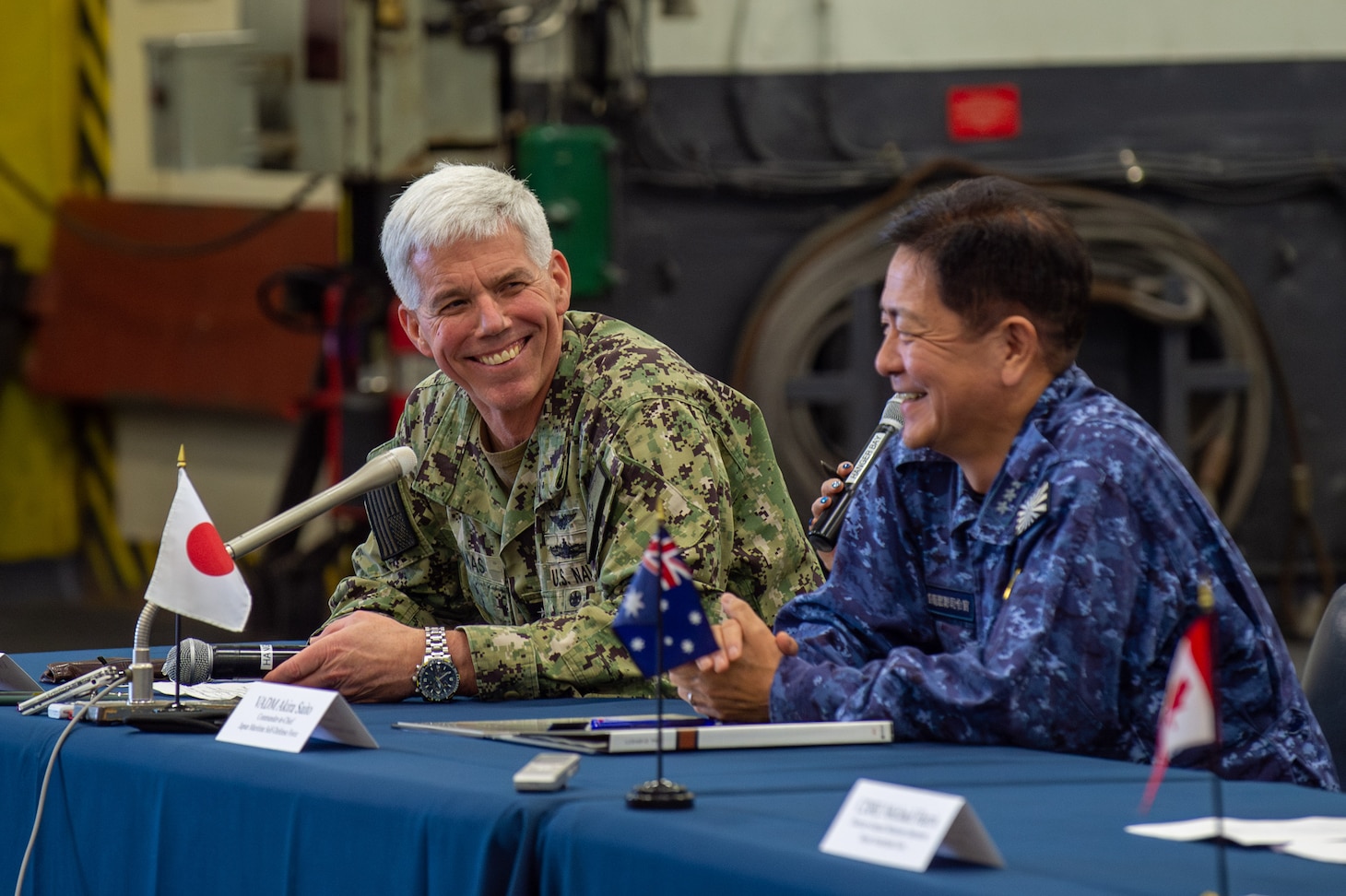 231111-N-GR586-1333 PACIFIC OCEAN (Nov. 11, 2023) Vice Adm. Akira Saito, right, Commander-in-Chief, Self-Defense Fleet, Japan Maritime Self-Defense Force (JMSDF), and Vice Adm. Karl Thomas, Commander, U.S. 7th Fleet, conduct a multilateral press conference aboard Nimitz-class aircraft carrier USS Carl Vinson (CVN 70) as part of Annual Exercise (ANNUALEX) 2023. ANNUALEX is a multilateral exercise conducted by naval elements of the Royal Australian, Royal Canadian, JMSDF, and U.S. navies to demonstrate naval interoperability and a joint commitment to a free and open Indo-Pacific. Vinson, flagship of Carrier Strike Group (CSG) ONE, is deployed to the U.S. 7th Fleet area of operations in support of a free and open Indo-Pacific. (U.S. Navy photo by Mass Communication Specialist 2nd Class Benjamin Ringers)