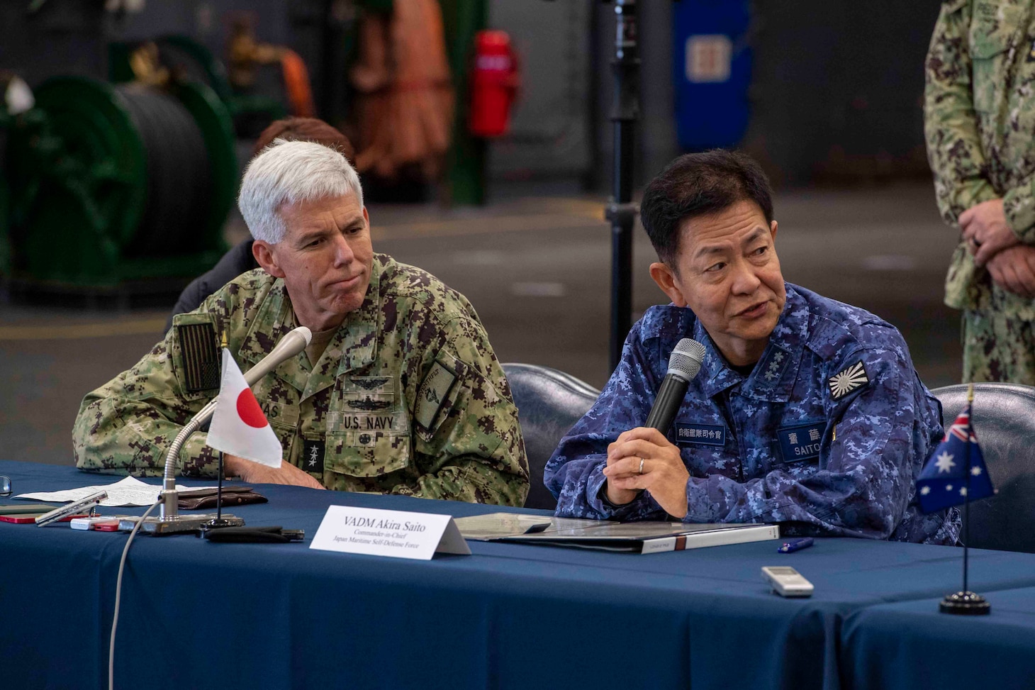 231111-N-TL932-1223 PHILIPPINE SEA (Nov. 11, 2023) Vice Adm. Karl Thomas, left, Commander, 7th Fleet and Vice Adm. Akira Saito, Commander in Chief, Self-Defense Fleet, Japan Maritime Self-Defense Force, conduct a multilateral press conference aboard Nimitz-class aircraft carrier USS Carl Vinson (CVN 70) as part of Annual Exercise (ANNUALEX) 2023. ANNUALEX is a multilateral exercise conducted by naval elements of the Royal Australian, Royal Canadian, Japan Maritime Self-Defense Force, and U.S. navies to demonstrate naval interoperability and a joint commitment to a free and open Indo-Pacific. Vinson, flagship of Carrier Strike Group ONE, is deployed to the U.S. 7th Fleet area of operations in support of a free and open Indo-Pacific. (U.S. Navy photo by Mass Communication Specialist 3rd Class Joshua Sapien)
