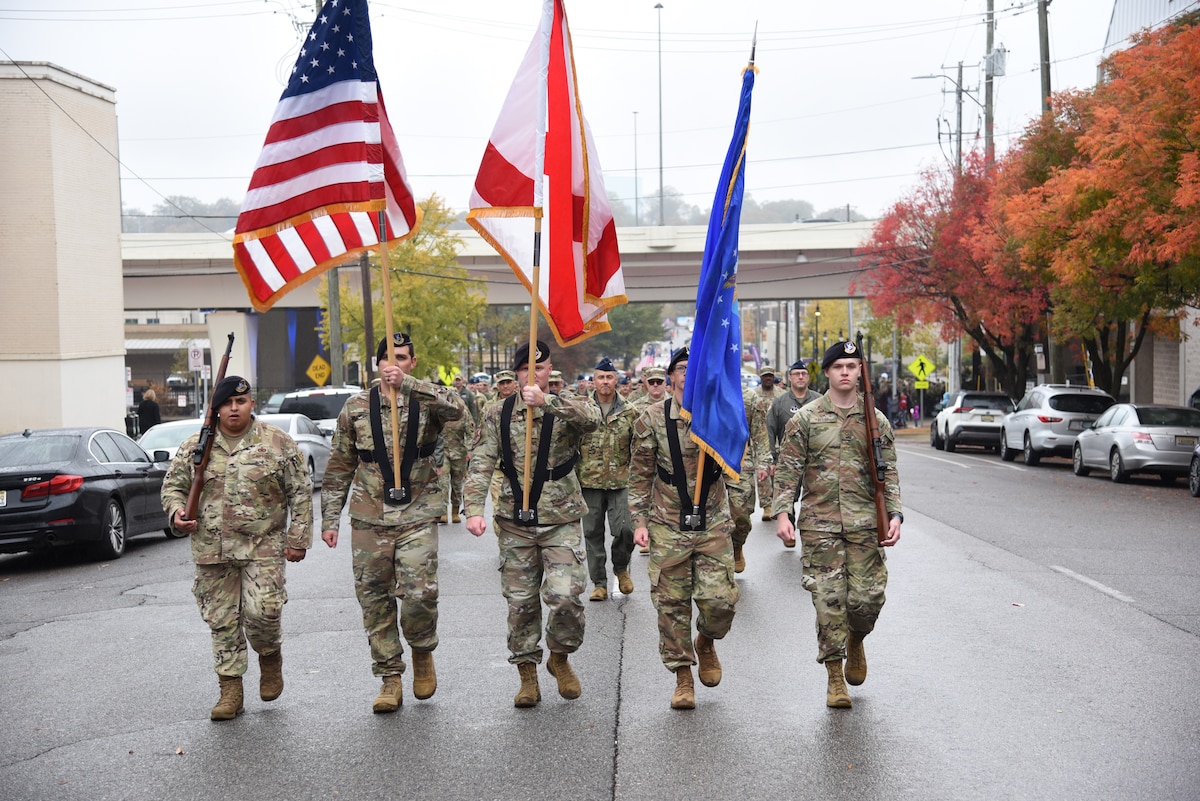 Members of the 117th Air Refueling Wing march during the annual Veterans Day parade in downtown Birmingham, AL, Nov. 11, 2023.