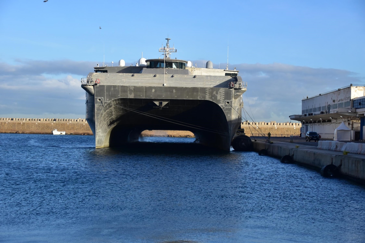 The Spearhead-class expeditionary fast transport USNS Trenton (T-EPF-5) arrives in Oran, Algeria for a scheduled port visit, Nov. 8, 2023. Trenton is currently operating in the U.S. Naval Forces Europe-Africa area of operations, employed by U.S. Sixth Fleet to support U.S., Allied, and partner interests. (U.S. Navy photo by Intelligence Specialist 2nd Class Isis Salyers)
