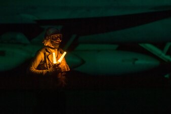 A Sailor stands by during flight operations aboard USS Ronald Reagan (CVN 76) in the Philippine Sea.