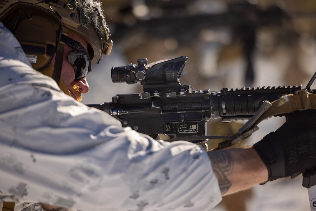 U.S. Marine Corps Cpl. Zane Vickers, a Wichita, Kansas native and combat engineer with 2d Battalion, 8th Marine Regiment, 2d Marine Division, fires his rifle during Mountain Warfare Training Exercise 2-23 on Marine Corps Mountain Warfare Training Center, Bridgeport, California, Jan. 28, 2023. MTX prepares units to survive and conduct extended operations in mountainous terrain during the winter. (U.S. Marine Corps photo by Lance Cpl. Ryan Ramsammy)