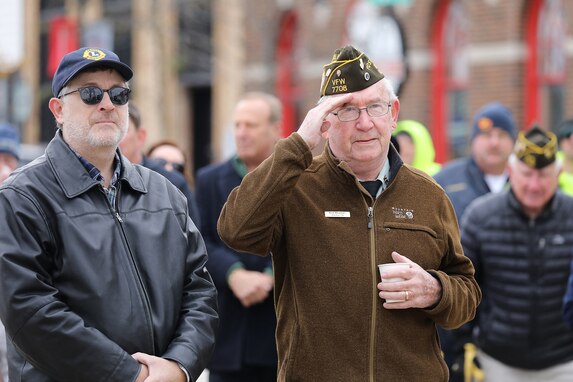 U.S. Air Force veteran Rich Bowman, right, salutes during the Village of Barrington’s Veteran’s Day ceremony, November 10, 2023.