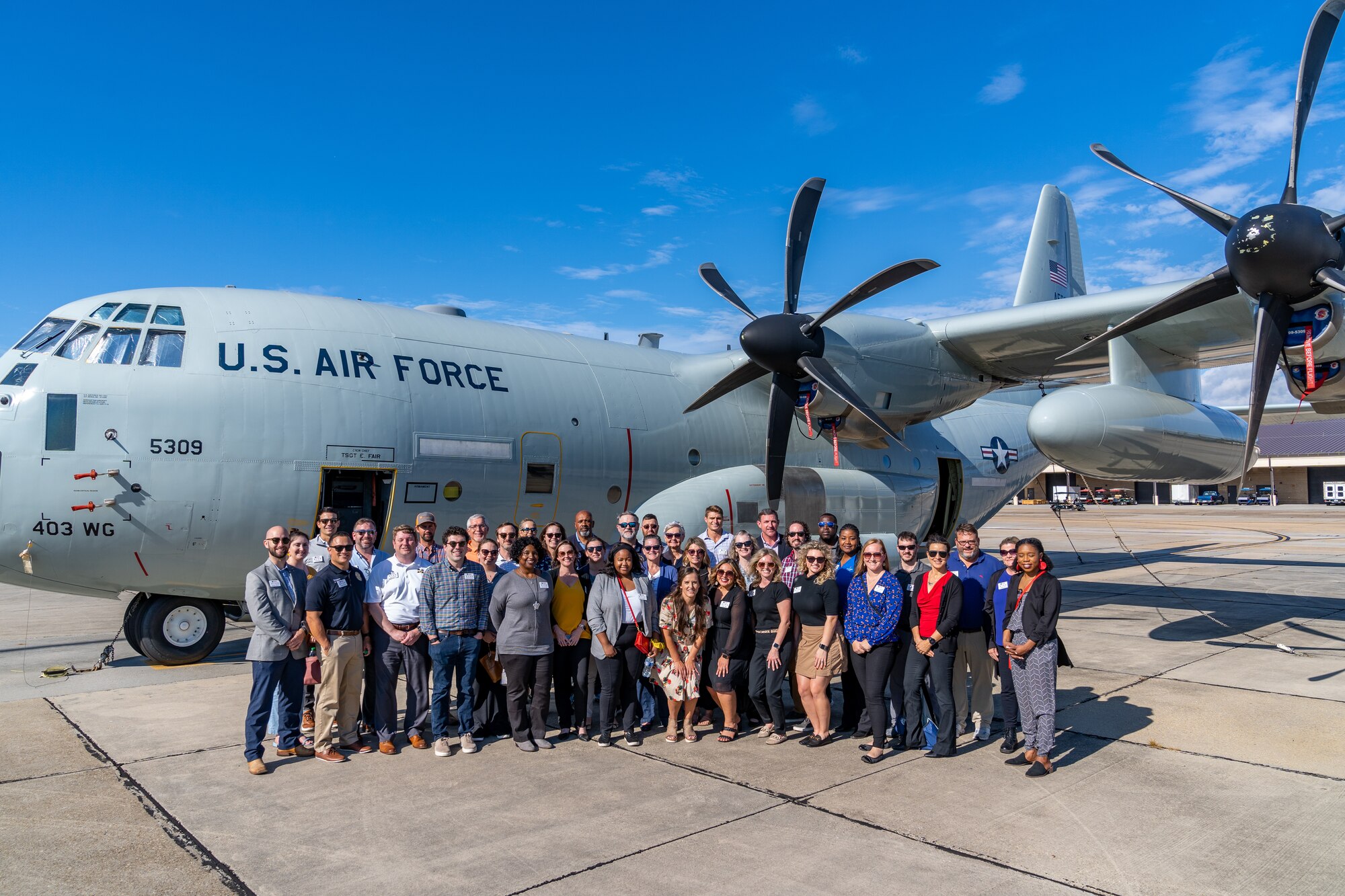 Local business and community leaders pose for a group photo during the Leadership Gulf Coast tour at Keesler Air Force Base, Mississippi, Nov. 9, 2023.
