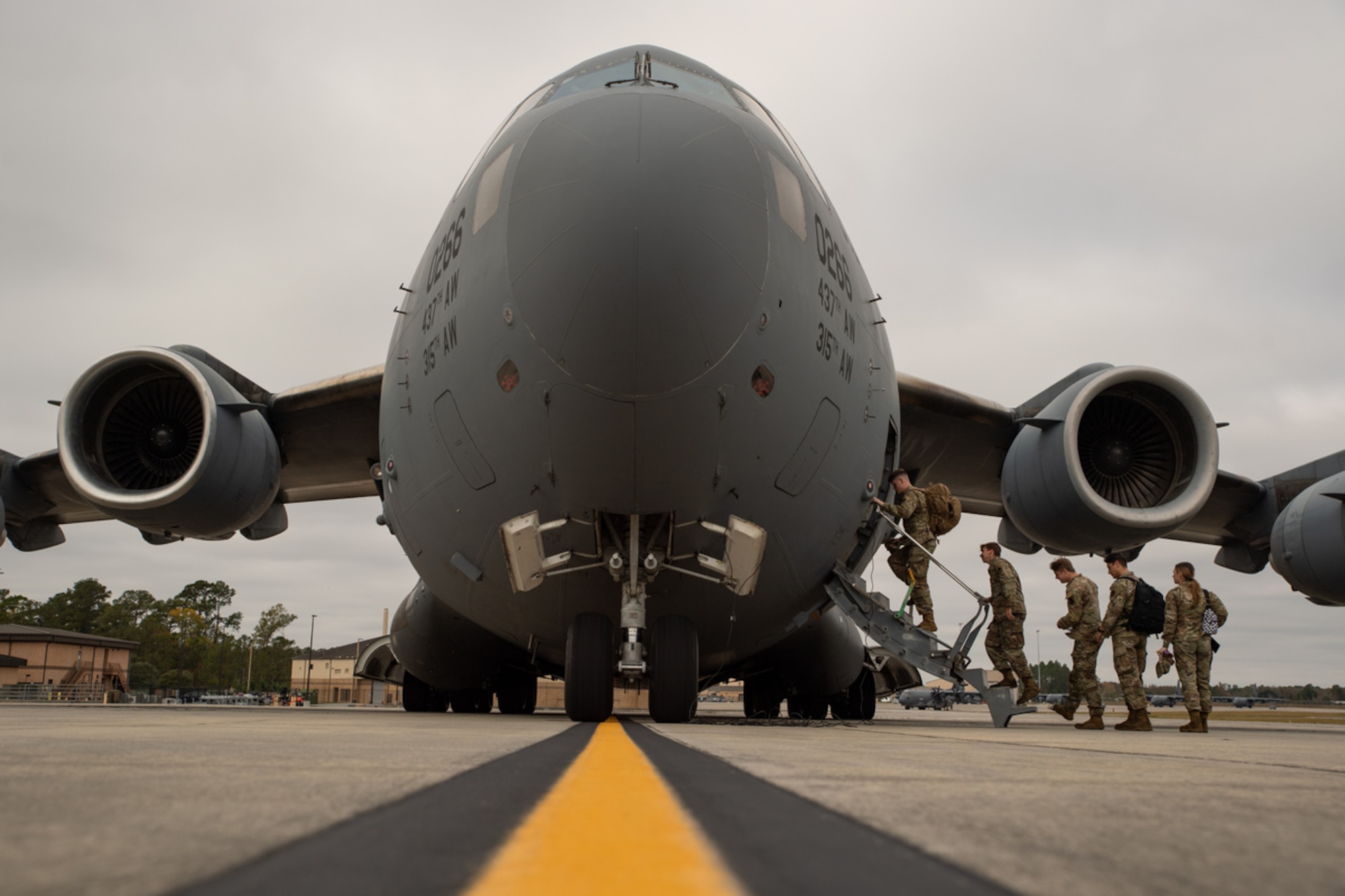 Airmen load onto an aircraft