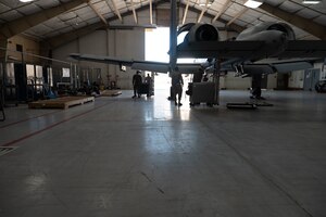 U.S. Air Force Airmen work on an A-10C Thunderbolt II at Davis-Monthan Air Force Base. The A-10 aircraft was designed for close air support of ground forces. (U.S. Air Force photo by Airman 1st Class Robert Allen Cooke III)
