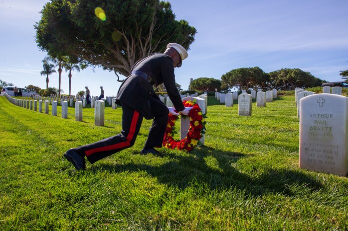 U.S. Marine Corps Brig. Gen. James A. Ryans, the Commanding General of Marine Corps Recruit Depot San Diego and Western Recruiting Region places a wreath upon the headstone of former Sergeant Major of the Marine Corps, Sgt. Maj. Leland D. Crawford, at Fort Rosecrans National Cemetery, San Diego, California, Nov. 10, 2023. The wreath laying ceremonies are a continuing part of the Marine Corps birthday tradition and honor the service to Corps and Country. (U.S. Marine Corps photo by Sgt. Sydney Smith)
