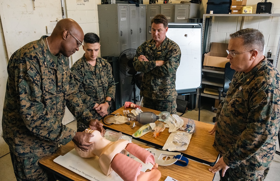 U.S. Sailors take part in a practical application exercise about simulated breath restoration during an Advanced Trauma Life Support Class, on Camp Foster, Okinawa, Japan, Nov. 7, 2023. During the training, sailors received guidance from experienced instructors affiliated with the American College of Surgeons. This instruction enabled the service members to enhance their trauma management techniques to teach life-saving skills to their junior counterparts. (U.S. Marine Corps photo by Cpl. Jonathan Beauchamp)