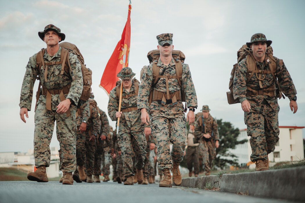 U.S. Marines with the Provost Marshal’s Office, Headquarters and Support Battalion, Marine Corps Installations Pacific, conduct a five-kilometer hike on Camp Foster, Okinawa, Japan, Nov. 9, 2023. The hike was conducted in celebration of the Marine Corps’ 248th birthday, as well as to increase morale and readiness within the unit. (U.S. Marine Corps photo by Cpl. Alex Fairchild)