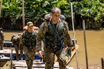 Sgt. 1st Class Ronnie Lewellen, an advisor assigned to the 1st Security Forces Assistance Brigade, conducts jungle movement and transportation methods during the academics portion of Southern Vanguard 24 in Belem, Brazil, Nov. 3, 2023. During jungle familiarization, Lewellen reconnected with one of his trainees from basic combat training.