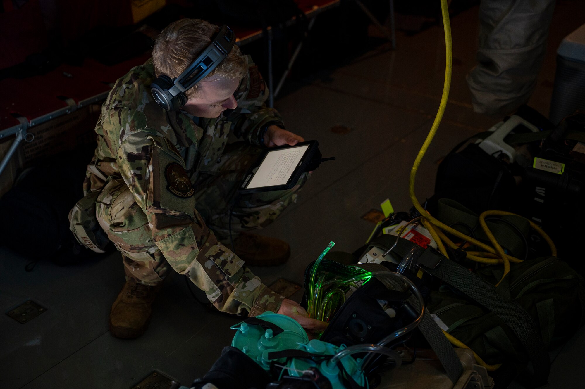 An Airman using medical equipment
