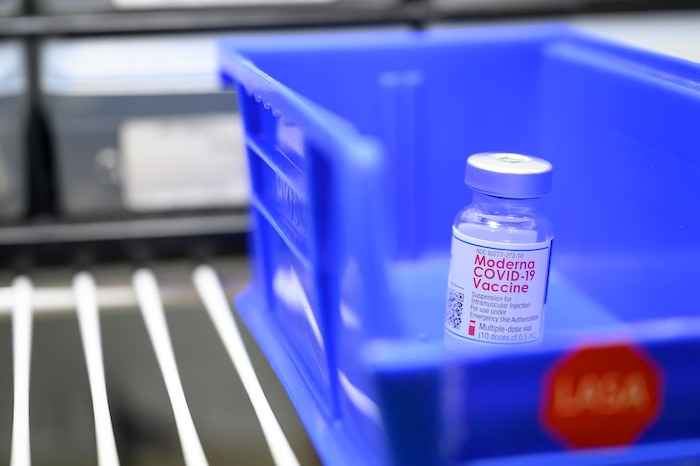 Close-up of Moderna COVID-19 vaccine vial. Medical Readiness Squadron immunizations clinics offer the COVID-19 vaccine, as well as other routine vaccines. (U.S. Air Force photo by Senior Airman Jacob M. Thompson)