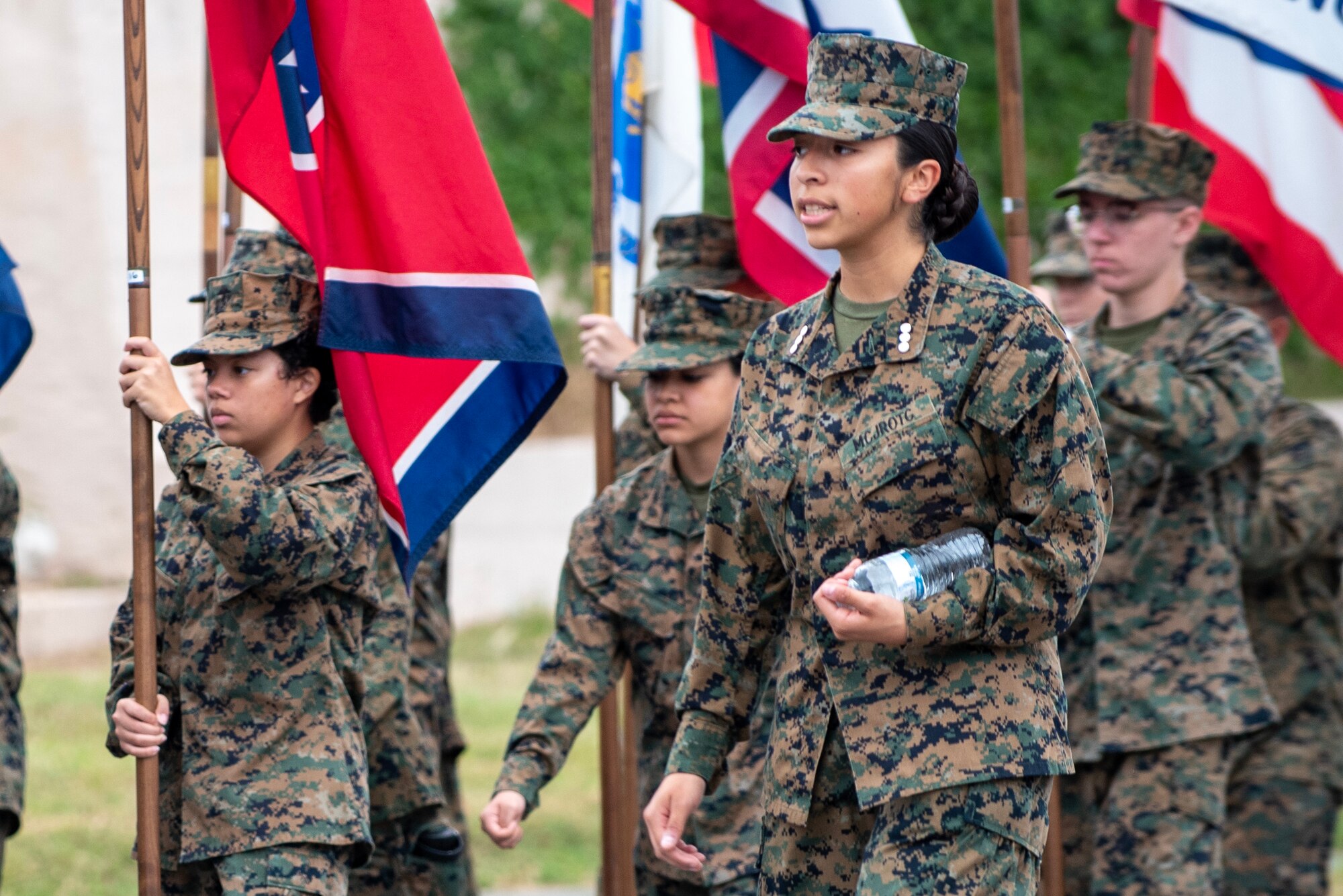 Kubasaki Marine Corps JROTC members march as a part of Kadena Air Base's Veterans day parade