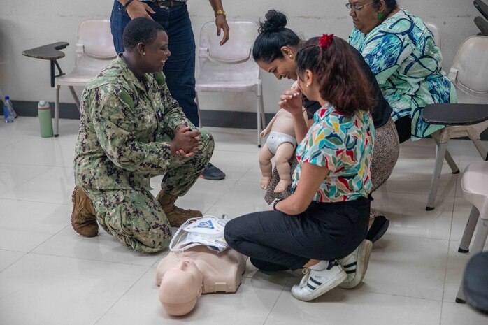 SUVA, Fiji (Nov. 1, 2023) – Hospital Corpsman 2nd Class Tanisha Clarke teaches CPR to Fiji National University students during Pacific Partnership 2023, Nov. 1, 2023.  Now in its 18th year, Pacific Partnership is the largest annual multinational humanitarian assistance and disaster relief preparedness mission conducted in the Indo-Pacific. (U.S. Navy photo by Mass Communication Specialist 2nd Class Megan Alexander)