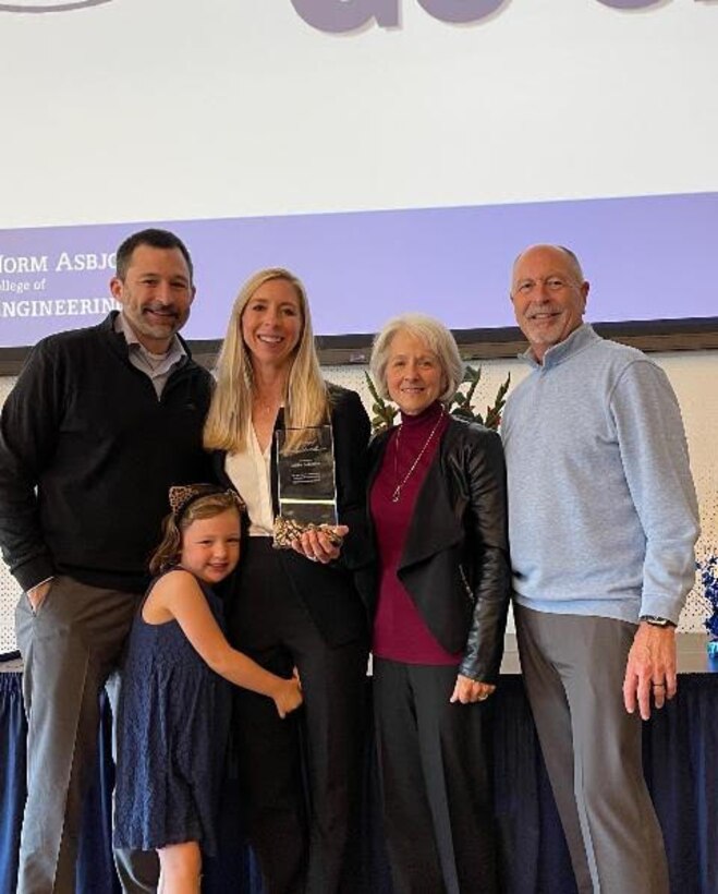 Naval Undersea Warfare Center Division, Keyport Undersea Systems Acquisition and Assessment Division Head Libby Solomon pictured with family during Montana State University’s 2023 Homecoming Awards and Academy of Distinguished Alumni ceremony.