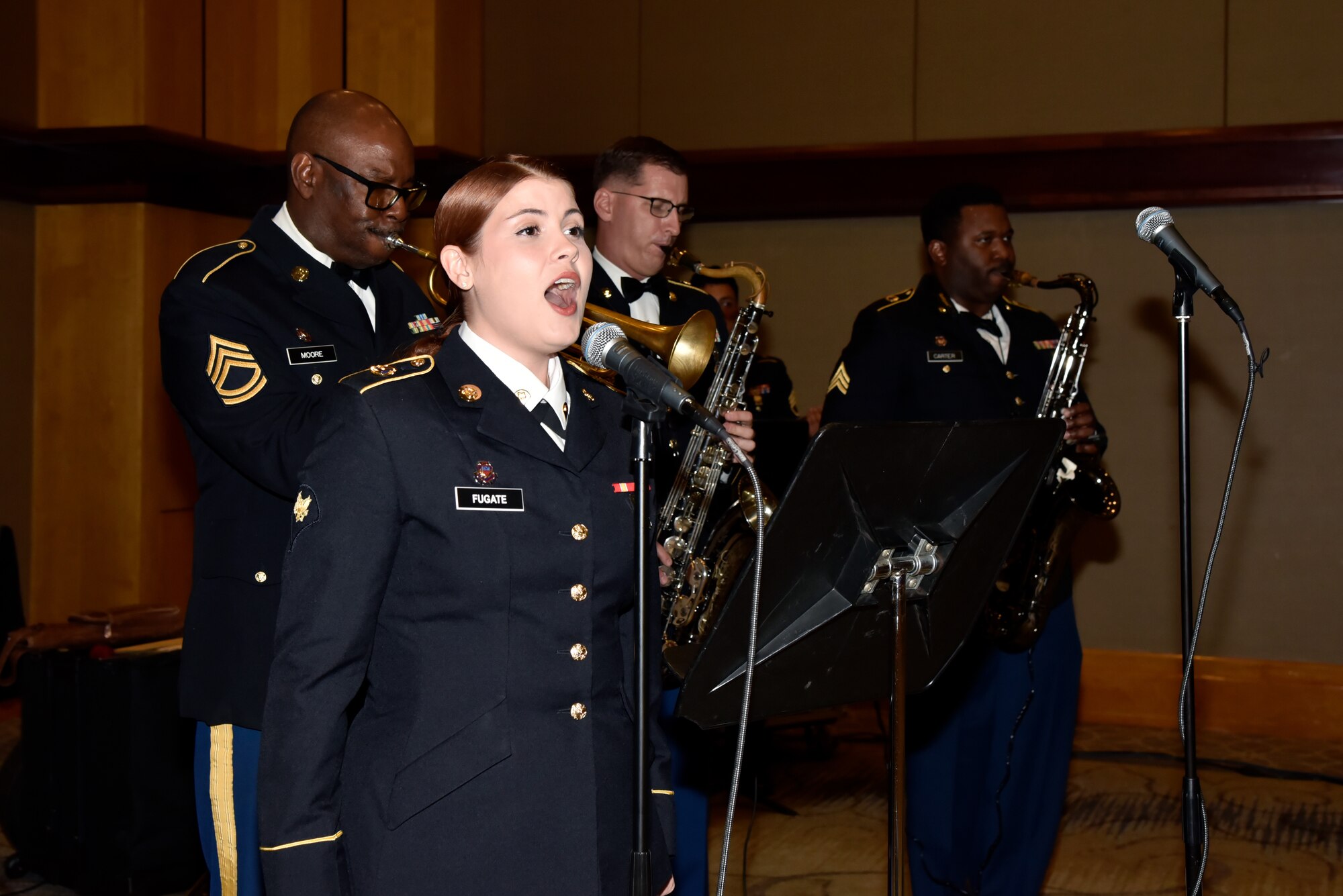 Members of the 313th Army Band, a U.S. Army Reserve Band stationed at Redstone Arsenal in Huntsville, AL, perform during the 76th National Veterans Day awards dinner hosted by the National Veterans Day Foundation on Nov. 10, 2023, in Birmingham, Alabama. A perpetual National Veterans Award was created in Birmingham for America’s first official National Veterans Day observance on November 11, 1954 as authorized by Congress. Its purpose is to honor an outstanding veteran in the United States each year who has made the greatest contribution to further the patriotic interests of veterans and veteran organizations throughout the country; and the award is presented at the National Veterans Award Dinner in Birmingham. (U.S. Air National Guard photo by Staff Sgt. Shelby Thurman)