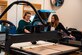 U.S. Air Force Lana Simmons, Bateman library technician and innovation lab manager, and Ashley Jellison, library director, use a computer numerical control router to engrave a sign for the innovation lab at Joint Base Langley-Eustis, Virginia, Nov 6, 2023. The lab was created for anyone with access to the Bateman library. (U.S. Air Force photo by Airman 1st Class Ian Sullens)