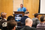 Naval Surface Warfare Center Indian Head Division modernization plan program manager Jim Sherman addresses the attendees at an Industry Day for infrastructure contractors in southern Maryland for the construction and architecture/engineering trades in preparation for the command's modernization efforts.