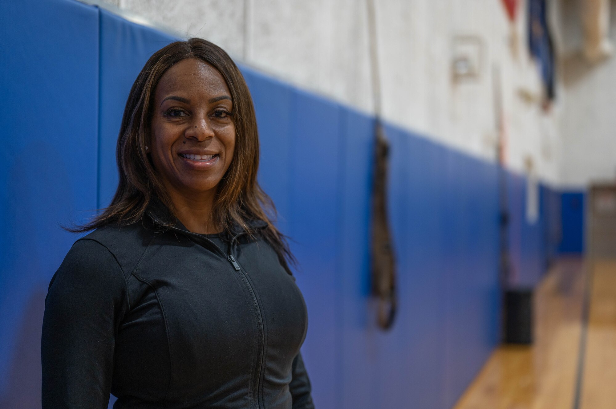Tech. Sgt. Katrina White, a financial manager with the 434th Air Refueling Wing, poses for a photo at Grissom Air Reserve Base, Ind., on October 14, 2023. White recently moved to the Hoosier Wing where she began leading kickboxing classes during Unit Training Assemblies. (U.S. Air Force photo by Airman 1st Class Elise Faurote)
