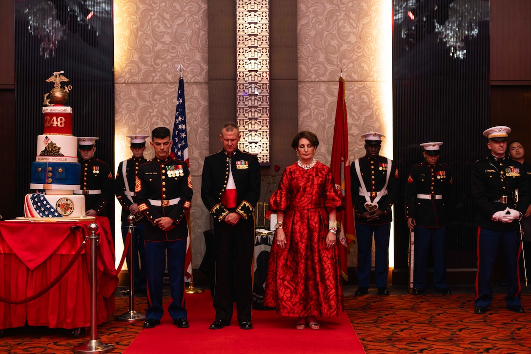 U.S. Marines with Marine Rotational Force-Southeast Asia, I Marine Expeditionary Force, U.S. Marines with Marine Corps Embassy Security Detachment Manila, and U.S. Ambassador MaryKay Loss Carlson, bow their heads during the invocation of the Marine Corps Embassy Security Detachment Manila Birthday ball in Manila, Philippines, Nov. 10, 2023. Each year, Marines across the globe celebrate Nov. 10, 1775, the day the Marine Corps was founded, and honor their proud legacy.  MRF-SEA is a Marine Corps Forces Pacific operational model that involves exchanges with subject matter experts, promotes security goals with Allies and Partners, and positions I MEF forces west of the International Date Line. (U.S. Marine Corps photo by Sgt. Shaina Jupiter)