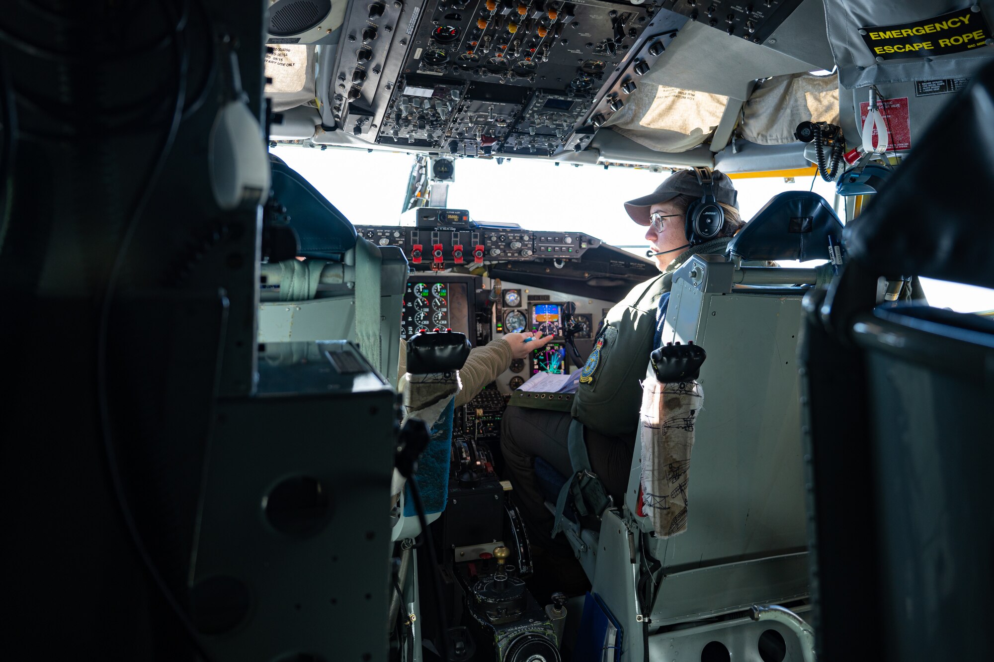 U.S. Air Force Capt. Bridgette Schneider, 351st Air Refueling Squadron KC-135 Stratotanker aircraft co-pilot, flies a KC-135 during aerial refueling operations over the European area of responsibility, Nov. 8, 2023.
