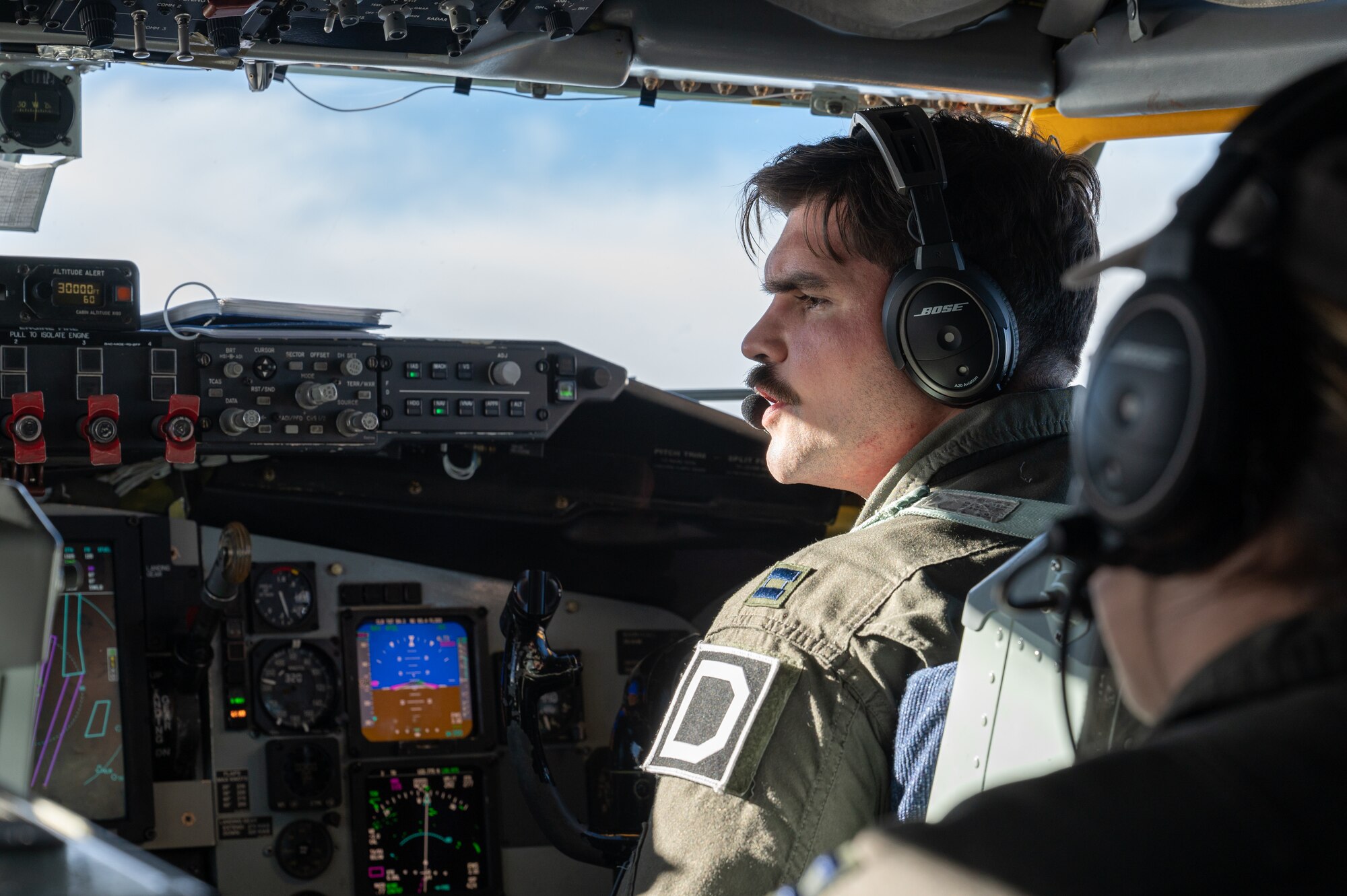 U.S. Air Force Capt. Tobin Nelson, 351st Air Refueling Squadron KC-135 Stratotanker aircraft co-pilot, flies a KC-135 during aerial refueling operations over the European area of responsibility, Nov. 8, 2023.