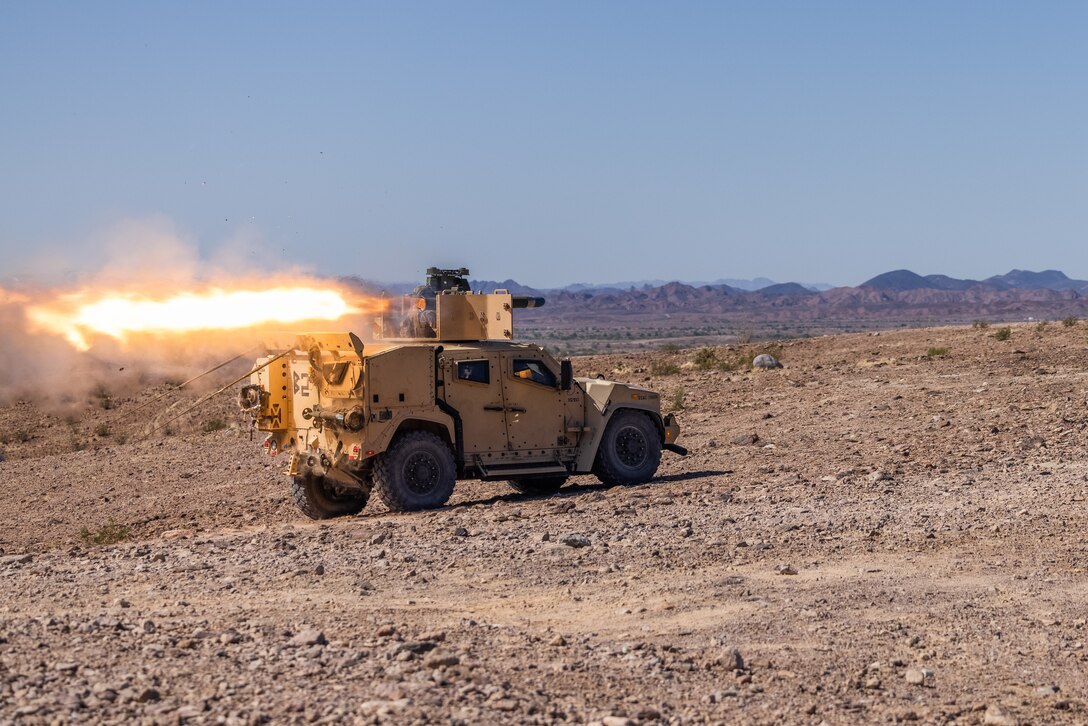 U.S. Marines with the Combined Anti-Armor Team (CAAT), 3rd Battalion, 2d Marine Regiment, 2d Marine Division fire a TOW missile from a Joint Light Tactical Vehicle during a range on the U.S. Army Yuma Proving Grounds, Arizona, Oct 21, 2023. CAAT utilizes various weapon systems to neutralize enemy armored assets. (U.S. Marine Corps photo by Lance Cpl. Eric Dmochowski)