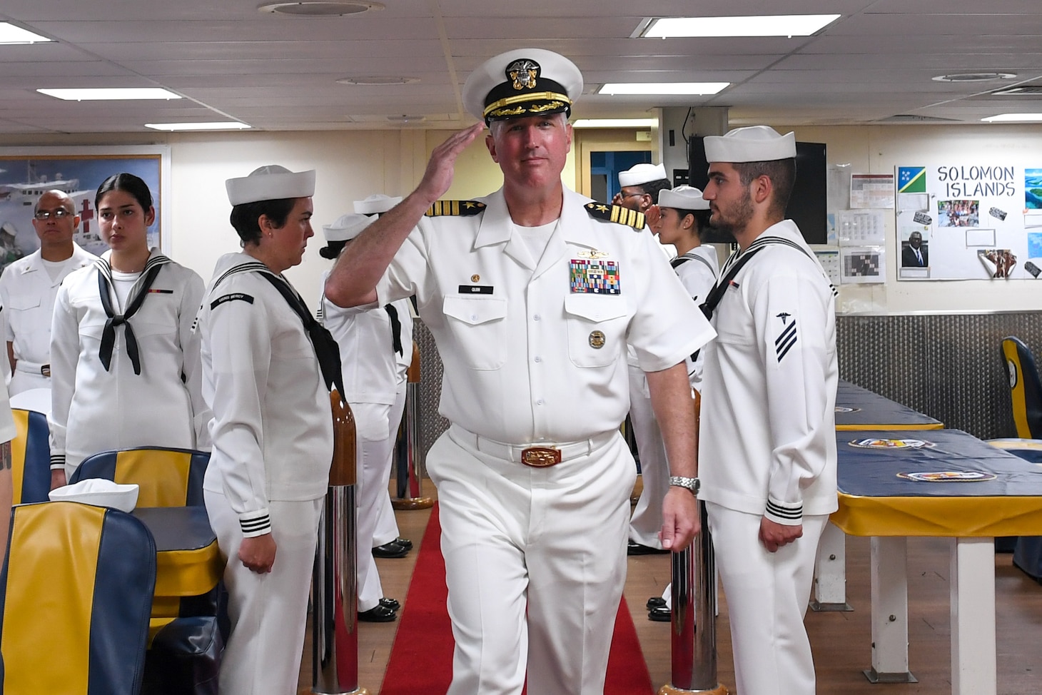 U.S. Navy Capt. Brian Quin, mission commander of Pacific Partnership 2024-1, is piped aboard the hospital ship USNS Mercy (T-AH 19) during the Pacific Partnership 2024-1 closing ceremony for the Republic of the Marshall Islands mission stop Nov. 10, 2023. Pacific Partnership, now in its 19th iteration, is the largest multinational humanitarian assistance and disaster relief preparedness mission conducted in the Indo-Pacific and works to enhance regional interoperability and disaster response capabilities, increase security stability in the region, and foster new and enduring friendships. (U.S. Navy photo by Mass Communication Specialist Seaman Justin Ontiveros)