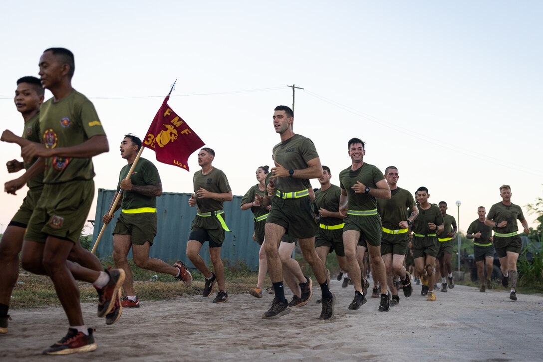 U.S. Marines with 3d Littoral Logistics Battalion, 3d Marine Littoral Regiment, 3d Marine Division, Philippine marines with 4th Marine Brigade, and service members with the Japanese Ground Self-Defense Force participate in a motivational run for the 248th Marine Corps Birthday during KAMANDAG 7, at Camp Cape Bojeador, Philippines, Nov. 10, 2023. KAMANDAG is an annual Philippine Marine Corps and U.S. Marine Corps-led exercise aimed at improving bilateral readiness and mutual capabilities in the advancement of a Free and Open Indo-Pacific. This year marks the seventh iteration of this exercise and includes participants from Japan, the Republic of Korea, and observers from the United Kingdom. (U.S. Marine Corps photo by Cpl. Malia Sparks)